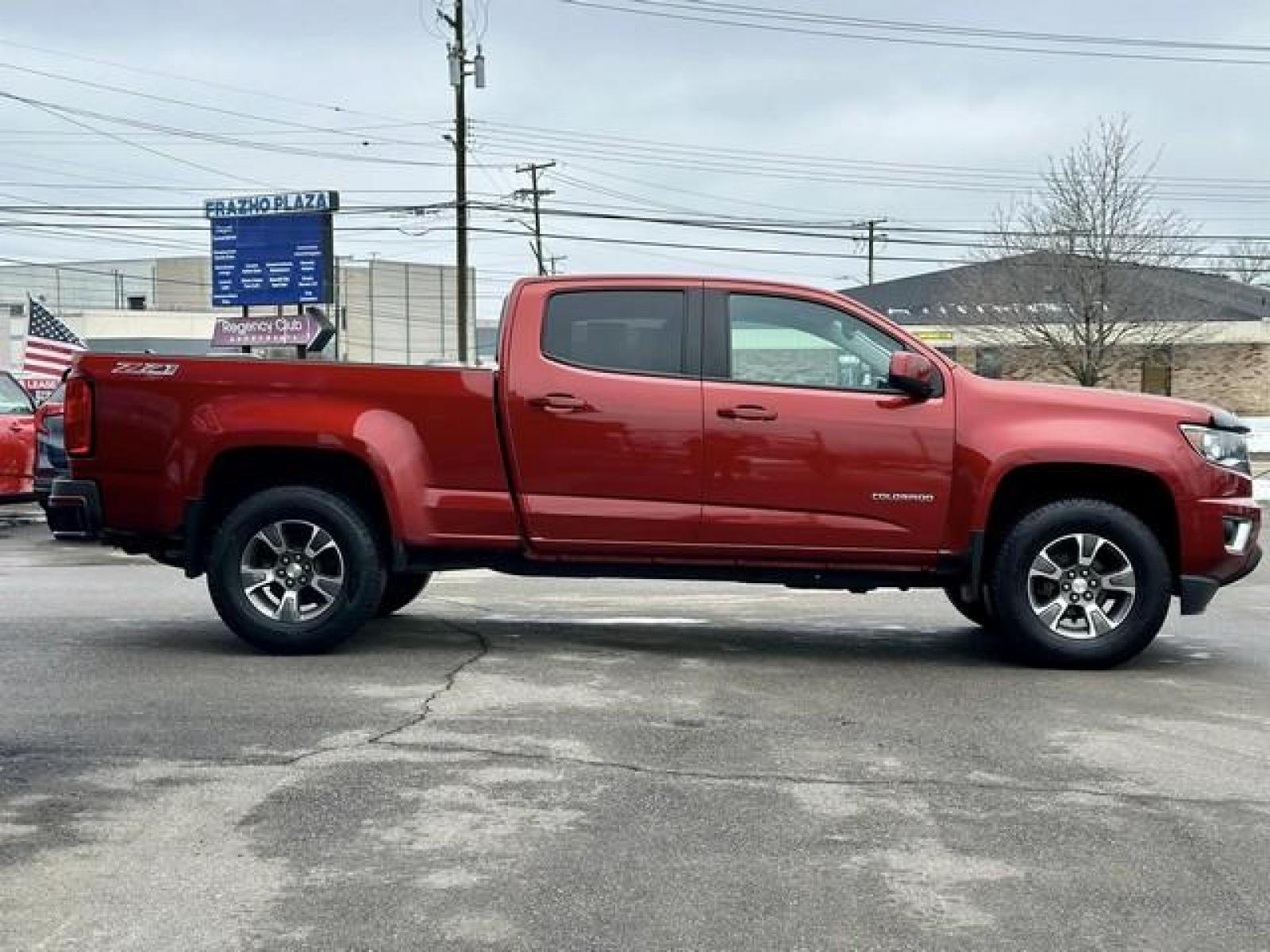 2016 RED CHEVROLET COLORADO (1GCGTDE38G1) with an V6,3.6L(217 CID),DOHC engine, AUTOMATIC transmission, located at 14600 Frazho Road, Warren, MI, 48089, (586) 776-3400, 42.485996, -82.974220 - Photo #3