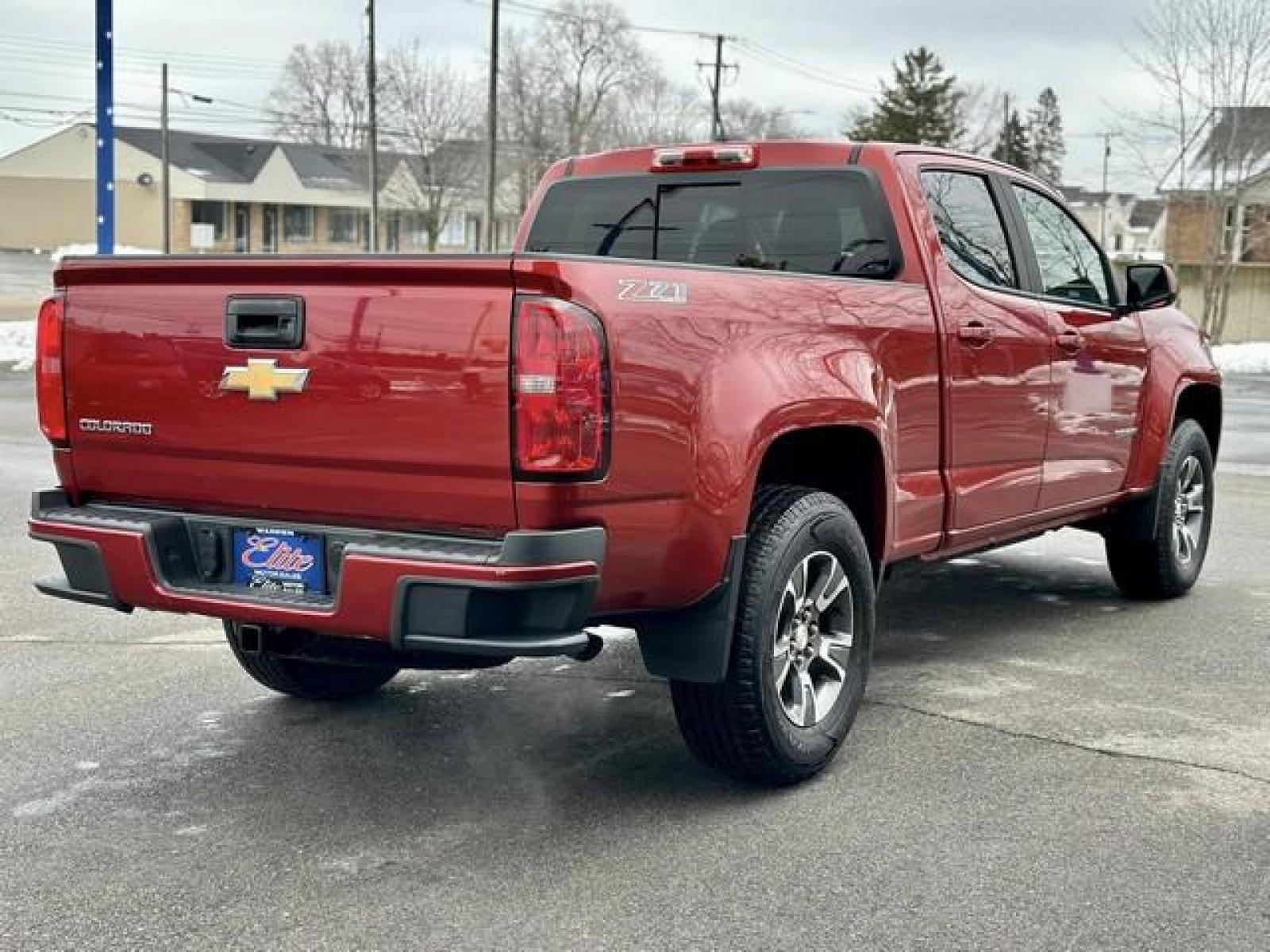 2016 RED CHEVROLET COLORADO (1GCGTDE38G1) with an V6,3.6L(217 CID),DOHC engine, AUTOMATIC transmission, located at 14600 Frazho Road, Warren, MI, 48089, (586) 776-3400, 42.485996, -82.974220 - Photo #4