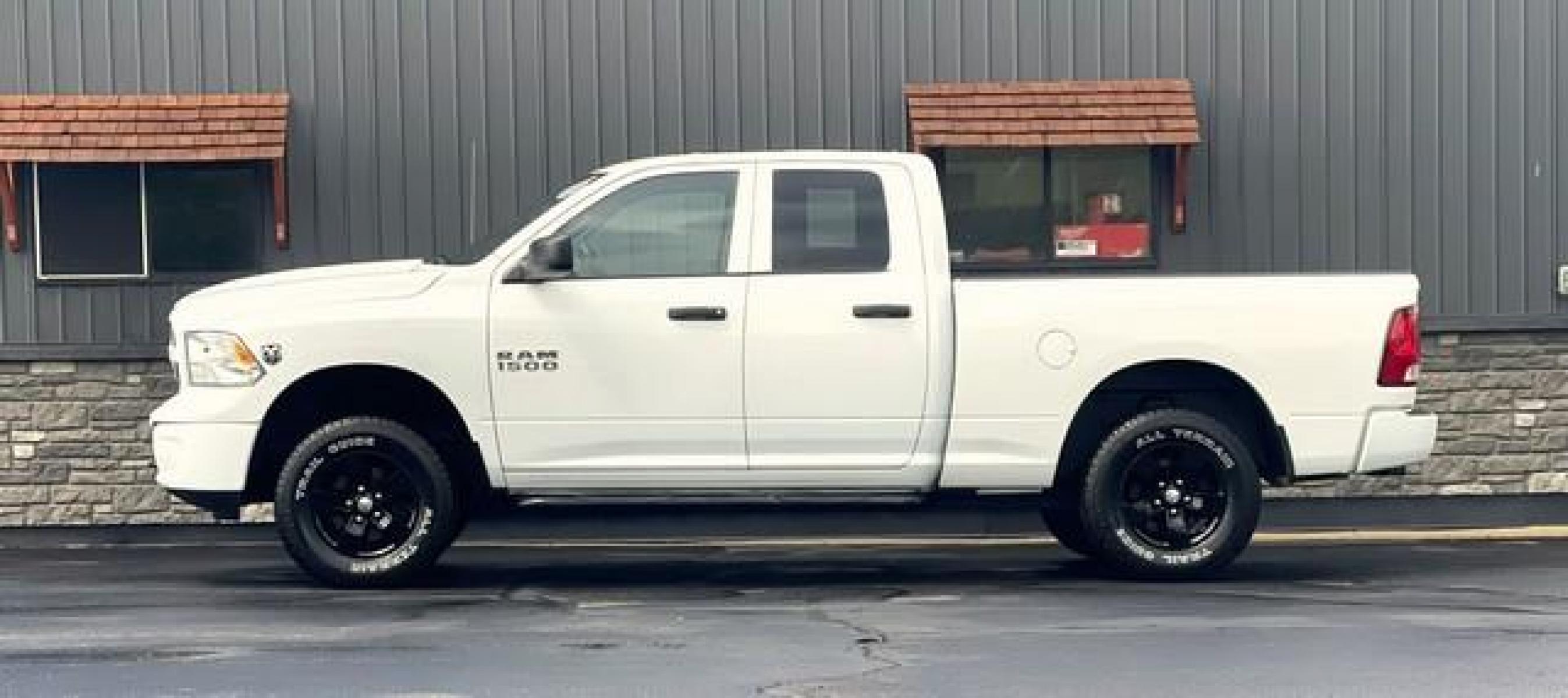 2015 WHITE RAM 1500 (1C6RR7FG9FS) with an V6,3.6L(220 CID),DOHC engine, AUTOMATIC transmission, located at 14600 Frazho Road, Warren, MI, 48089, (586) 776-3400, 42.485996, -82.974220 - Photo #0