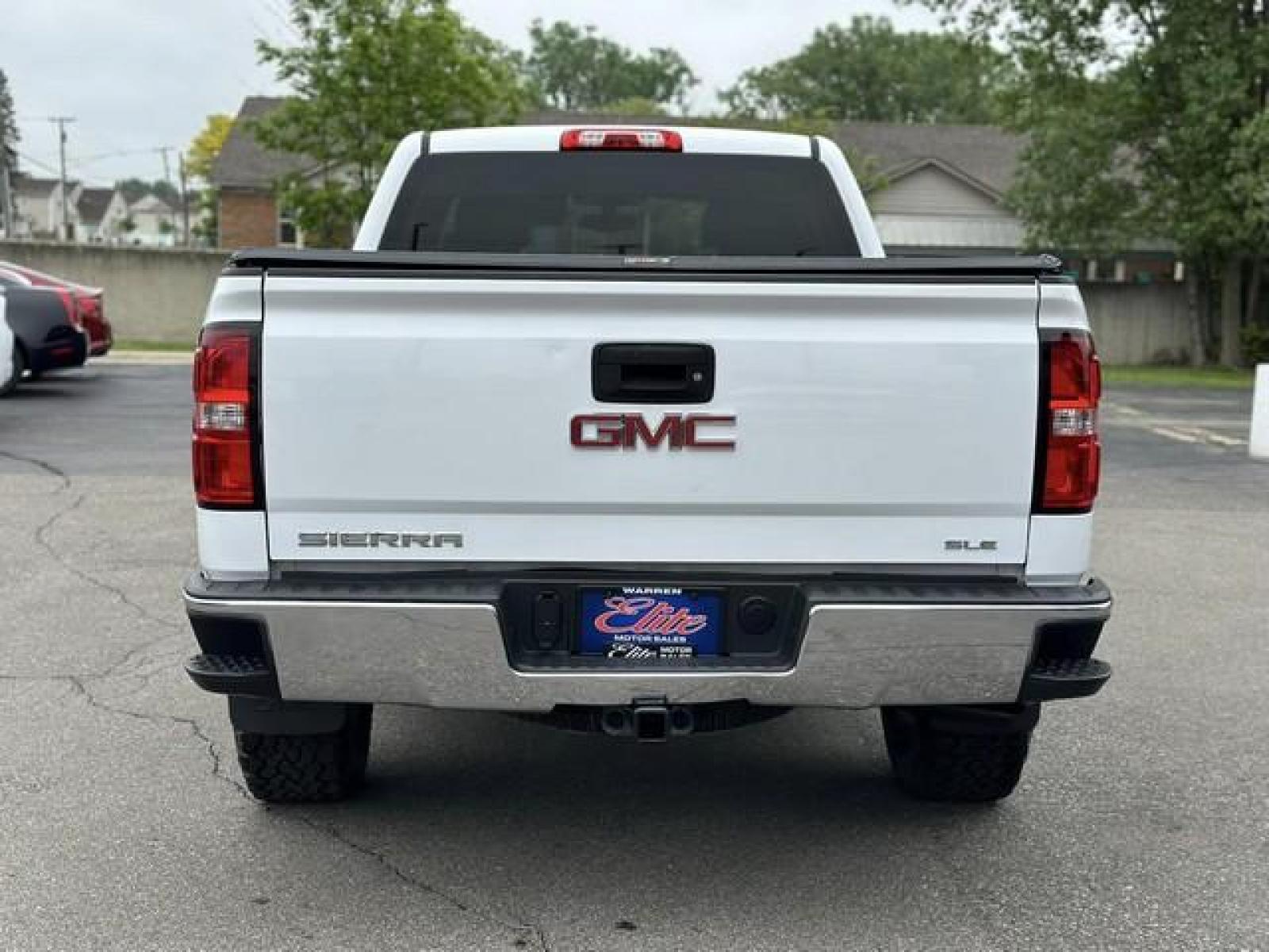 2014 WHITE GMC SIERRA 1500 (1GTV2UEH2EZ) with an V6,4.3L(262 CID),OHV engine, AUTOMATIC transmission, located at 14600 Frazho Road, Warren, MI, 48089, (586) 776-3400, 42.485996, -82.974220 - Photo #5
